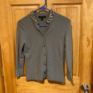 Women’s short cardigan cover ups, gray and white.